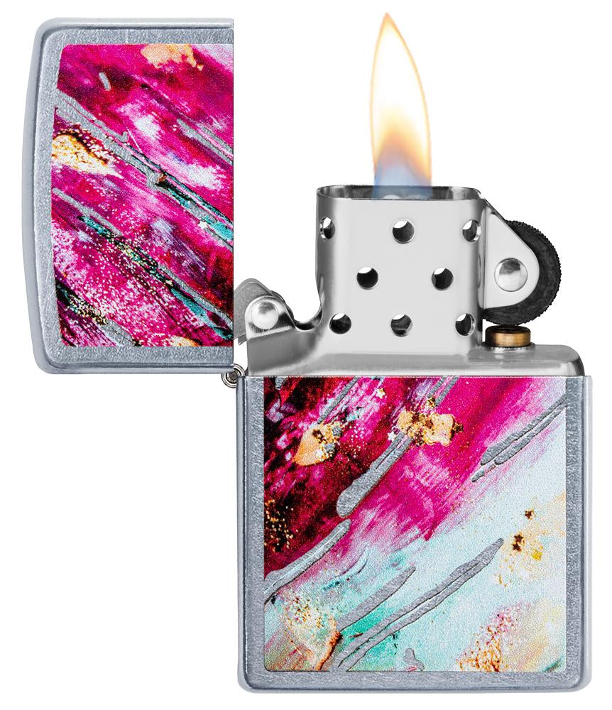 Briquet Zippo chromé avec motif mosaïque rose, ouvert avec flamme